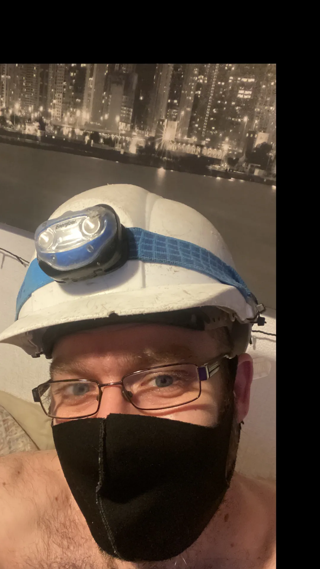 Hairy blue eyed builder